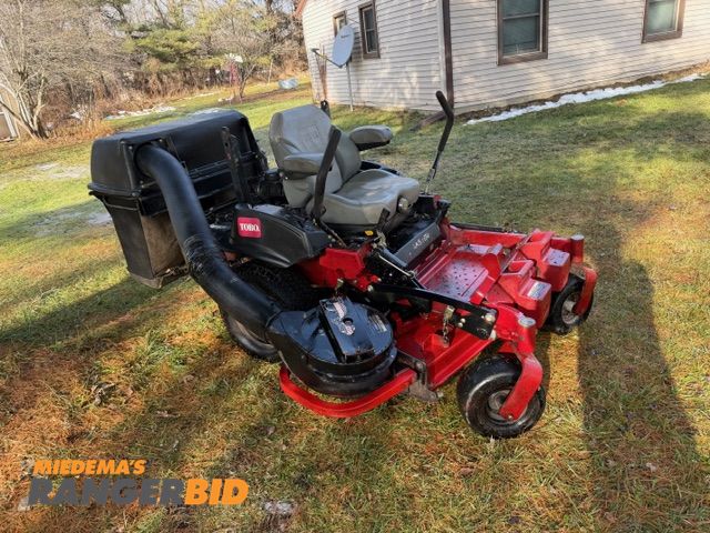 Lot 30-10860 - 2014 Toro 3000 series Zero-Turn Lawn Mower Commercial grade, general cosmetic wear, bags torn, runs ...