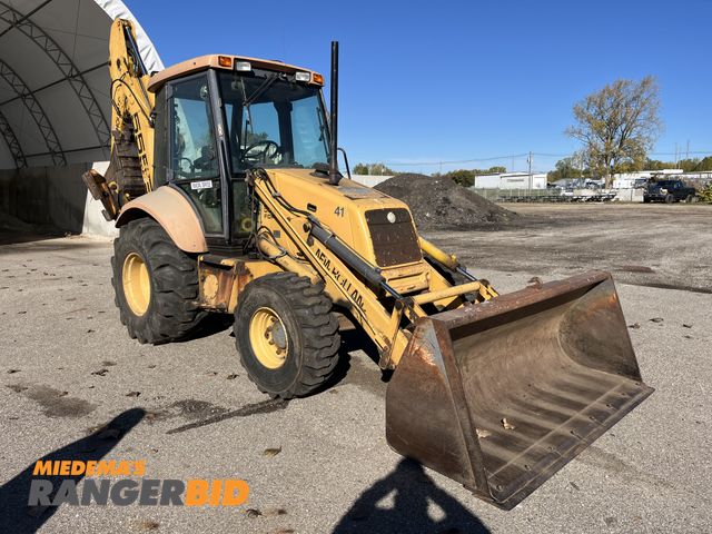 Lot 30-1954 - Ford New Holland 555E Backhoe Loader