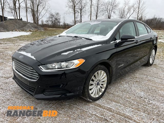 Lot 30-623 - 2016 Ford Fusion Hybrid with a 2.0L L4 DOHC 16V HYBRID engine. S with 105,704 miles Sedan Hybrid FWD