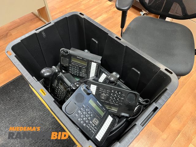 Lot 30-2779 - (2) Totes filled with Panasonic KX-DT543 Phones and (2) Filing cabinets