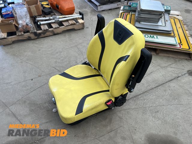 Lot 30-4140 - John Deere Lawn mower seat. Believed to be off a zero turn.