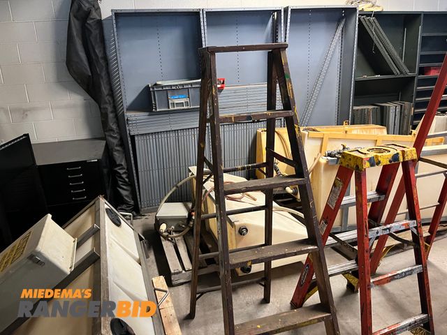 Lot 30-3559 - 2 Werner Ladders 1 is wood,1 is fiberglass