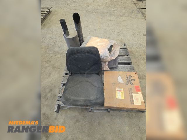 Lot 30-4837 - Pallet of miscellaneous equipment seats, exhaust, cat fan blade.