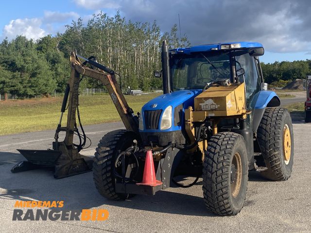 Lot 30-10601 - 1 2004 New Holland TS115A Tractor with Boom Mower 2004 New Holland 4x4 TS115A (Serial #ACP232356) wi...
