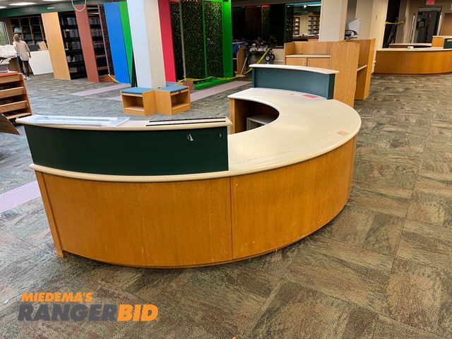 Lot 30-3358 - Lot includes all the desks shown, and Optelec Computer. Buyer is responsible for removal. Does not include printers.