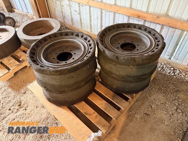 Lot 30-3605 - (4) Skid steer no flat tires and rims.