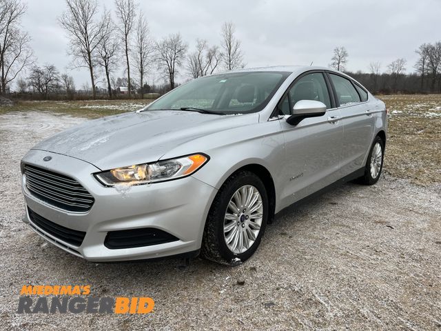 Lot 30-618 - 2014 Ford Fusion Hybrid with a 2.0L L4 DOHC 16V HYBRID engine. S with 86,985 miles Sedan Hybrid FWD