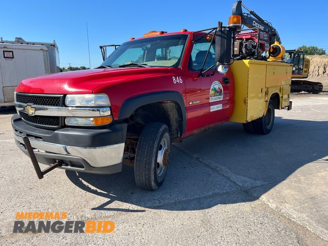 Lot 30-3504 - 2002 Chevrolet Silverado 3500 with a 6.0L V8 OHV 16V engine. Utility Body Regular Cab Long Box Pickup Truck RWD