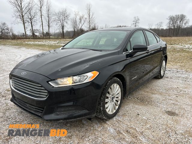 Lot 30-616 - 2014 Ford Fusion Hybrid with a 2.0L L4 DOHC 16V HYBRID engine. S with 81,165 miles Sedan Hybrid FWD