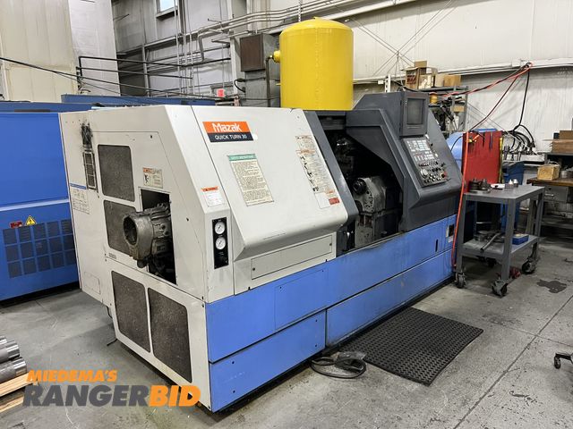 Lot 30-2643 - Set of (2) Lathes 1994 &amp; 1997 Mazak Quick Turn 35N and 30N CNC Lathes Comes with custom stock ho...