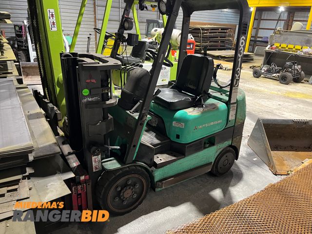 Lot 30-643 - Mitsubishi FGC25K Forklift Capacity: 5,000 lb lift capacity 
Dimensions: 6 ft 5 in long, 5 ft wide, and 6 ft 9 in hig...