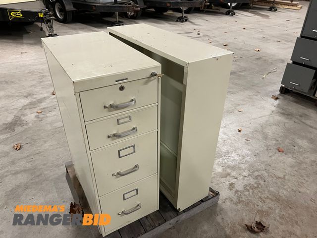 Lot 30-3996 - Lot includes one filing cabinet with keys and one shelving unit.