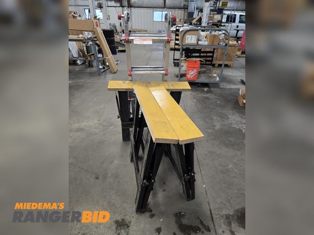 Lot 30-1395 - Folding metal ladder and (3) saw horses.  All in good shape.