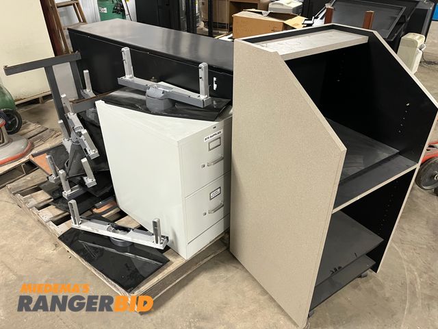 Lot 30-544 - Lot includes large quantity of monitor/TV stands (2) cabinets and a podium