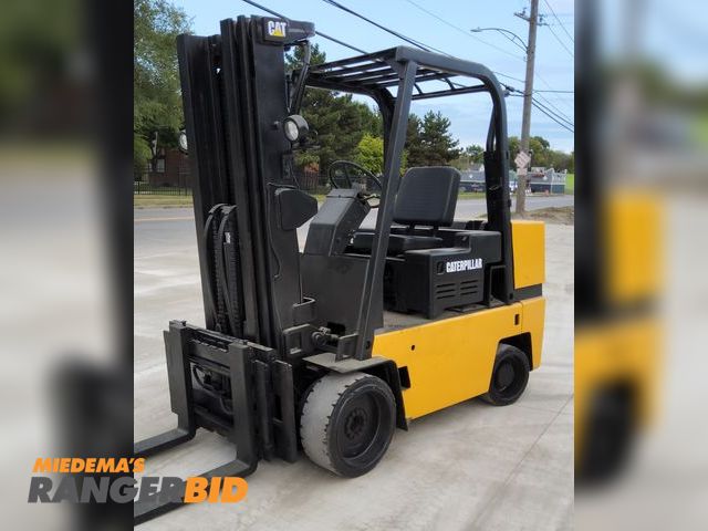 Lot 30-12003 - Caterpillar 10,000lbs Capacity Forklift Model TC100D, make your own inspection, Sold as is where is, Forklift and dock onsite to a...
