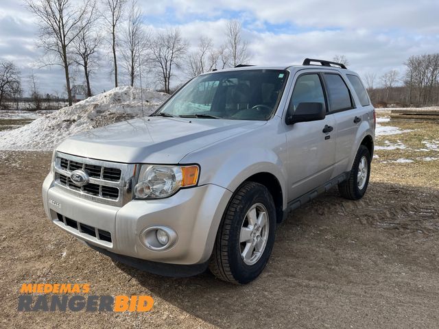 Lot 30-3071 - 2011 Ford Escape with a 2.5L L4 DOHC 16V engine with 48,279 miles XLT