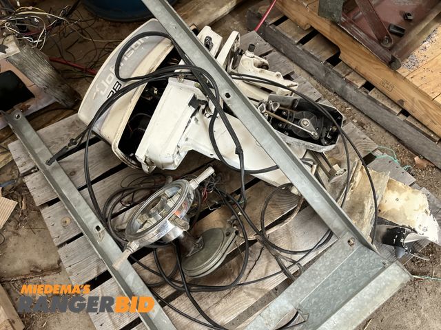 Lot 30-1612 - Johnson 28 2 stroke boat motor with steering column