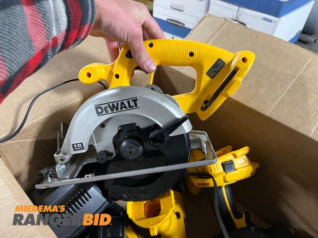 Lot 30-542 - Lot includes Dewalt Power tools, Nikon camera, Ice maker, Black &amp; Decker drill, and 3 cabinets