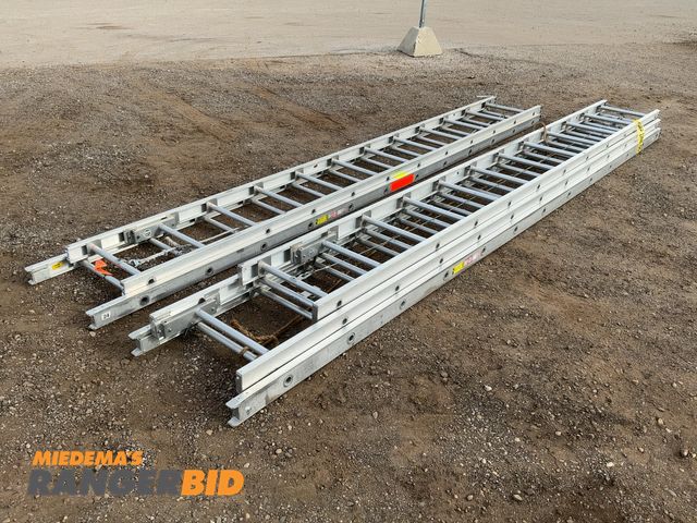 Lot 30-2360 - (2) Aluminum Extension Ladders, one is a 24' two-section and other is believed to be a 36' 3-section...