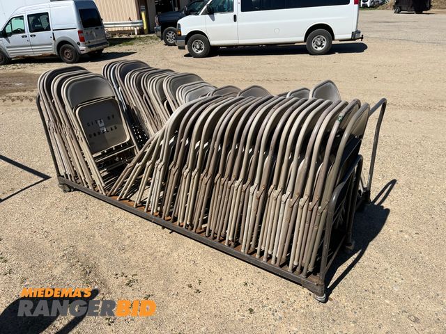 Lot 30-2210 - 2 racks of metal folding chairs.