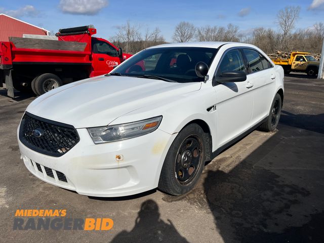 Lot 30-2207 - 2014 Ford Taurus with a 3.5L V6 DOHC 24V engine. Police Sedan FWD