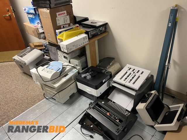 Lot 30-4404 - Lot includes printers, safe, computers, type writer, and more. . .