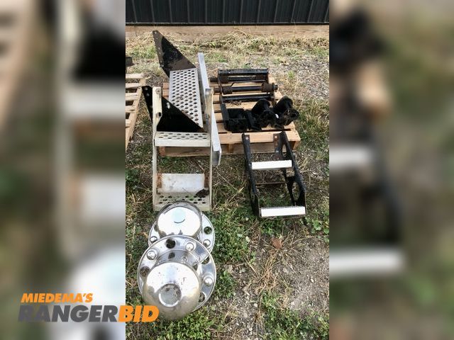 Lot 30-29B - (2) frame steps, (2) wheel hub covers, (2) heavy duty ramp springs, (3) turn buckles, see photo's fo...