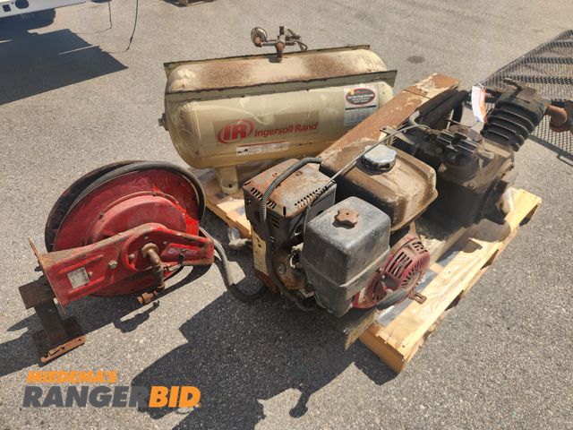 Lot 30-1272 - Gas Powered Ingersoll Rand Air Compressor with hose reel and miscellaneous attachments, runs and ope...