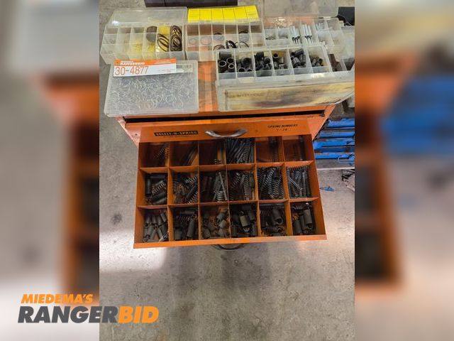Lot 30-4877 - Pallet of miscellaneous connectors, nuts, bolts, clamps, 2 empty drawer racks, and a select a spring...