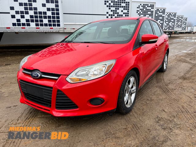 Lot 30-408 - 2014 Ford 2014 Ford Focus with a 2.0L L4 DOHC 16V engine. SE 31,003 miles Sedan FWD