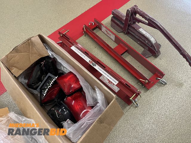 Lot 30-4733 - Lot includes emergency lights, Line Cages, and Hose Clamp