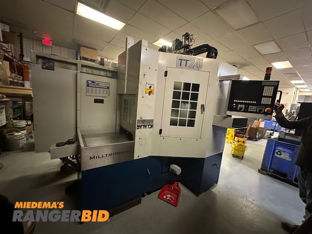 Lot 30-37804 - 2013 Milltronics TT24 Twin Table Milling Machine designed for production.  Table A is in the machine...
