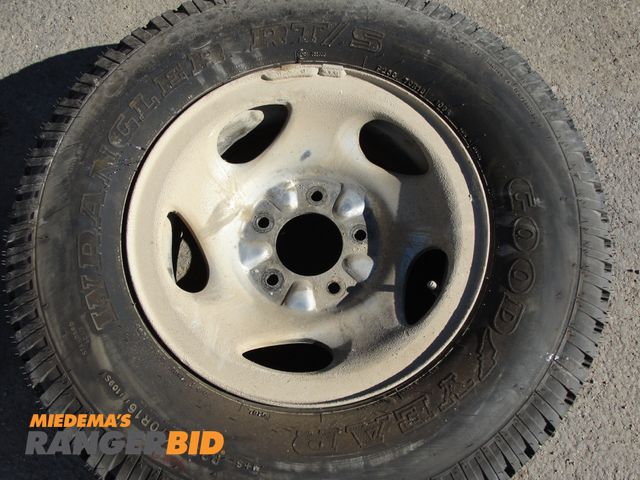 Lot 30-4861 - 3 3 mounted used tires. Goodyear 225-75-16, Michelin 235-70-16, Goodyear 255-70-16 used but...