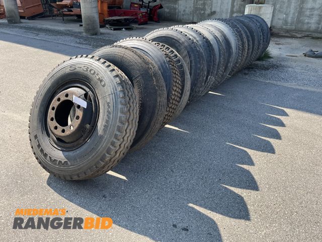 Lot 30-2347 - Large quantity of tube type tires on buddwheels Michelin, Goodyear  10.00 R20, 11.00 R20, 12R225 var...