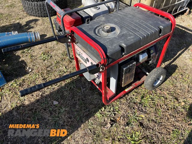 Lot 30-1984 - Generac 7000 EXL Portable Gas Powered Electric Start Recoil Start Generator