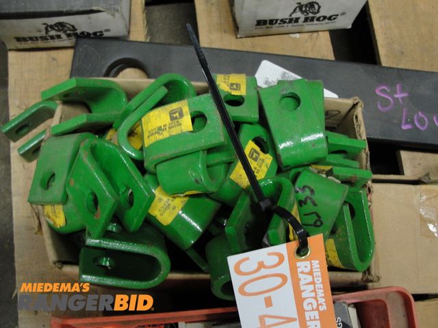 Lot 30-4870 - New John Deere Miscellaneous parts All brand new John Deere parts; various items ranging from Flail mower blades, links, clip...