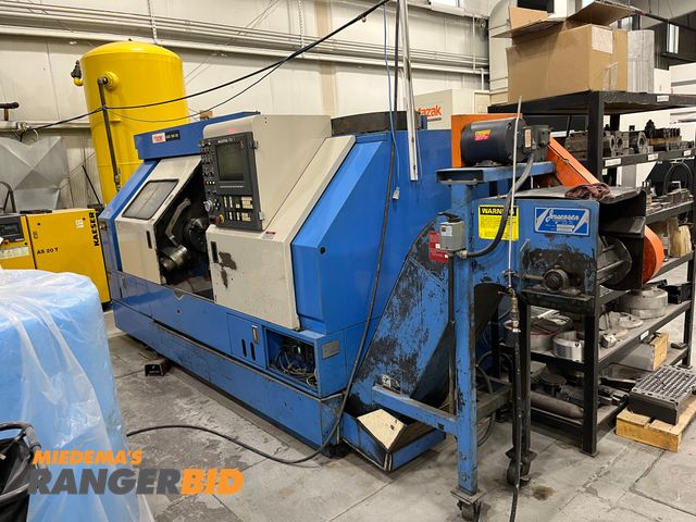 Lot 30-2643 - 1994 Mazak Quick Turn 35N CNC Lathe Comes with custom stock holder. Seller will load.