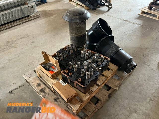 Lot 30-3914 - 2 Pallet of items including Donaldson Air Cleaners, Cummins N14 heads, a carburetor, and more