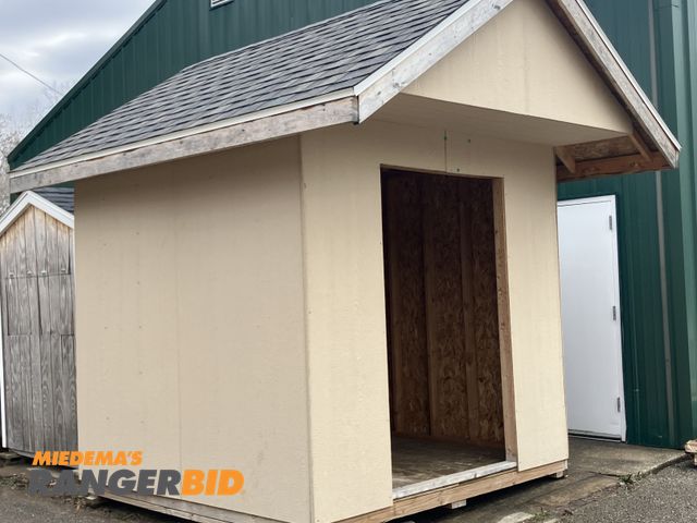Lot 30-11052 - Storage shed. Approximate max. dimensions: Height 136", width 127", depth 146"