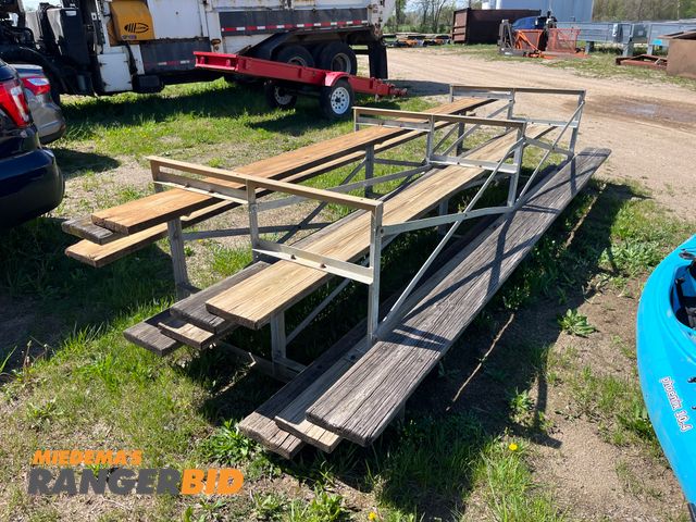 Lot 30-110 - (2) sets of bleachers. 15' long  3 seats.
