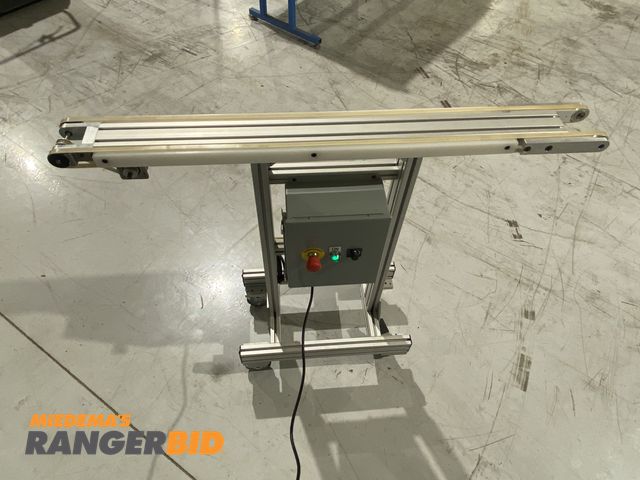 Lot 30-5 - Dual-Belt Driven Conveyor, Automatic Sensor Stop, Variable Speed, 48" L  

Seller will assist with l...