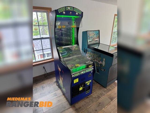 Lot 30-54606 - Putt Fore Prizes redemption arcade game manufactured by OK Manufacturing.  It features a golf theme ...