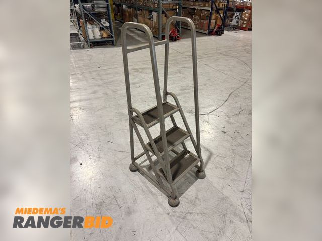 Lot 30-42 - Rolling 3 Step Steel Ladder.  Spring wheels that activate when no weight is on them.