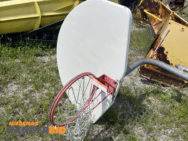 Lot 30-1178 - (1) 10' Basketball Hoop with Pole Metal, has concrete on the bottom.