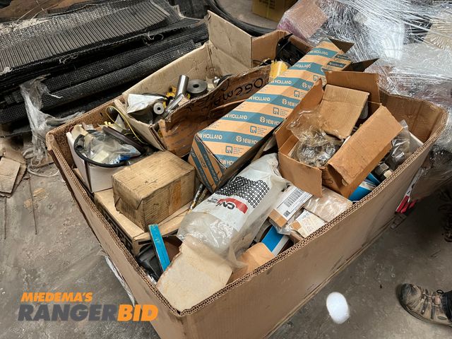 Lot 30-2242 - Box of tractor parts as well as hydraulic parts.