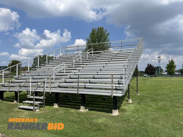 Lot 30-1681 - (2) Sets of Grand Stands / Bleachers Features: 14 rows of aluminum seats, center isle with railings,...
