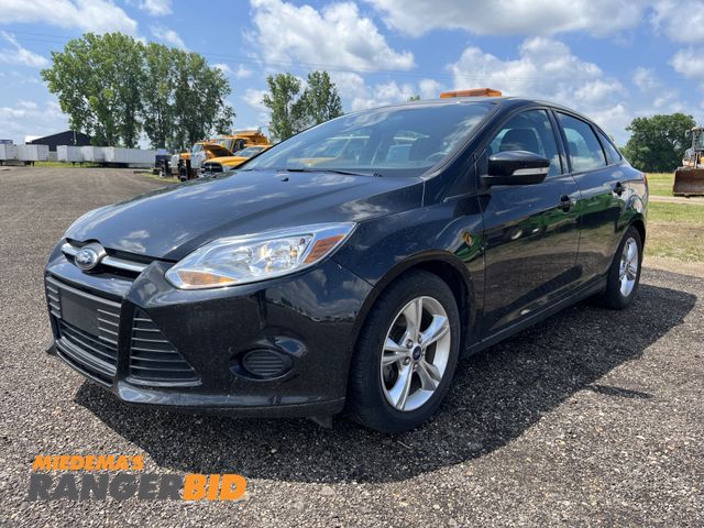 Lot 30-728 - 2014 Ford Focus with a 2.0L L4 DOHC 16V engine. SE with 24,805 miles FWD