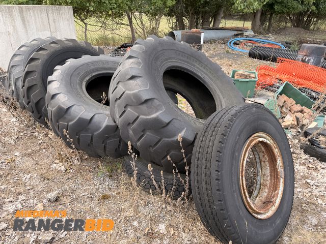 Lot 30-11386 - (5) loader tires and (2) truck tires