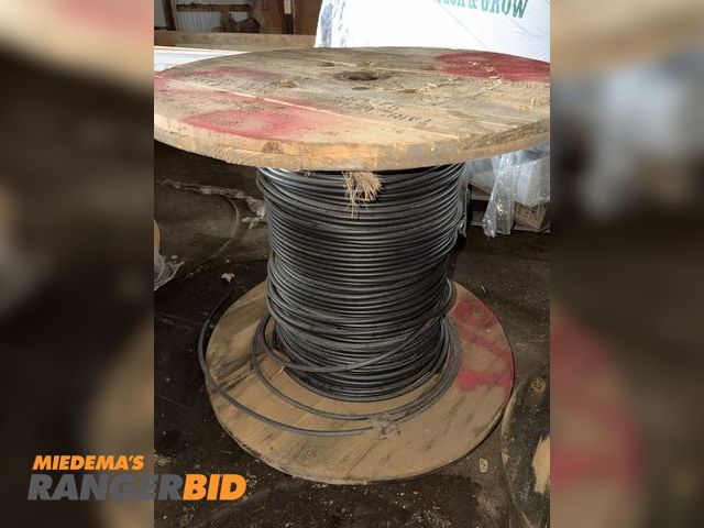 Lot 30-5719 - (1) spool of 600V, 19 strand black rubber coated copper cable.