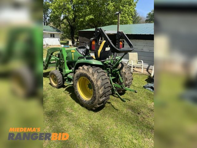 Lot 30-11210 - John Deere tractor four wheel drive, with bucket, 3033R excellent running condition, 3241 hours,